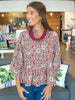 Petals & Peplum Top