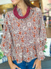 Petals & Peplum Top