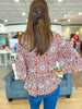 Petals & Peplum Top